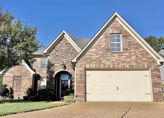 front of property with a garage