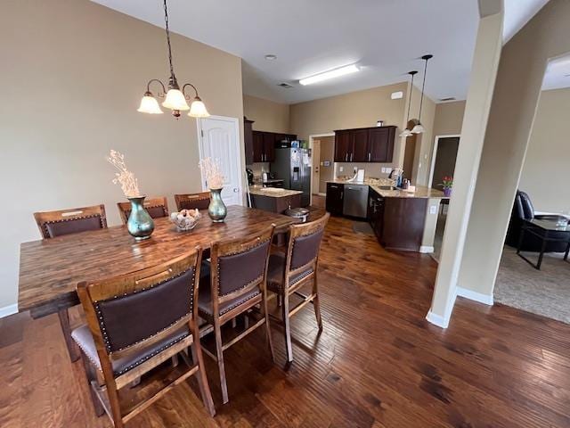 dining area featuring dark hardwood / wood-style flooring