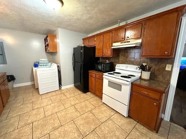 kitchen with backsplash, black appliances, a textured ceiling, and light tile patterned flooring