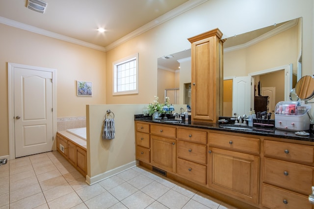 bathroom with tile patterned flooring, vanity, ornamental molding, and decorative columns