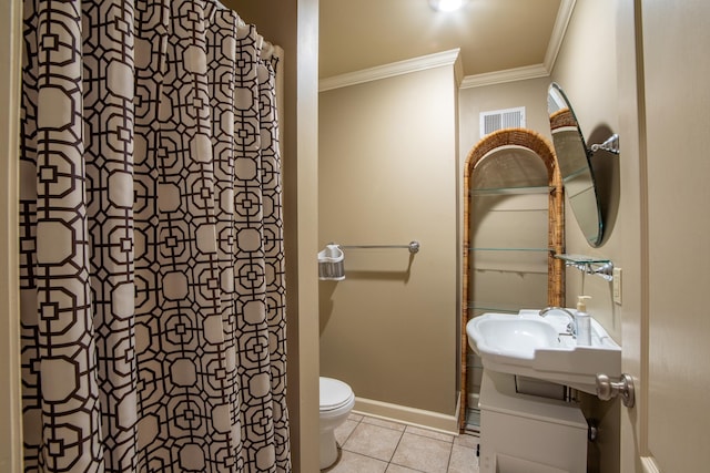 bathroom featuring tile patterned flooring, vanity, toilet, crown molding, and a shower with curtain