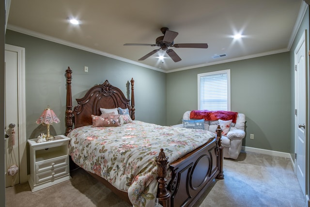 carpeted bedroom featuring crown molding and ceiling fan