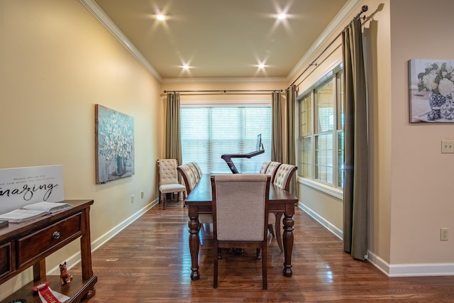 dining room featuring crown molding and dark hardwood / wood-style flooring