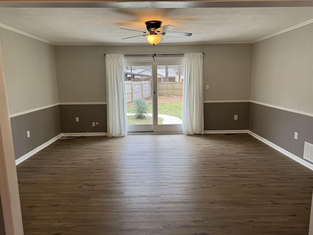 unfurnished room with dark hardwood / wood-style flooring, crown molding, a textured ceiling, and ceiling fan