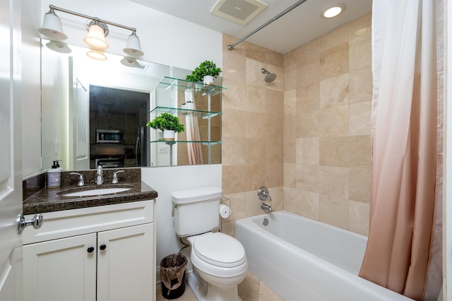 full bathroom with vanity, shower / bath combination with curtain, and toilet