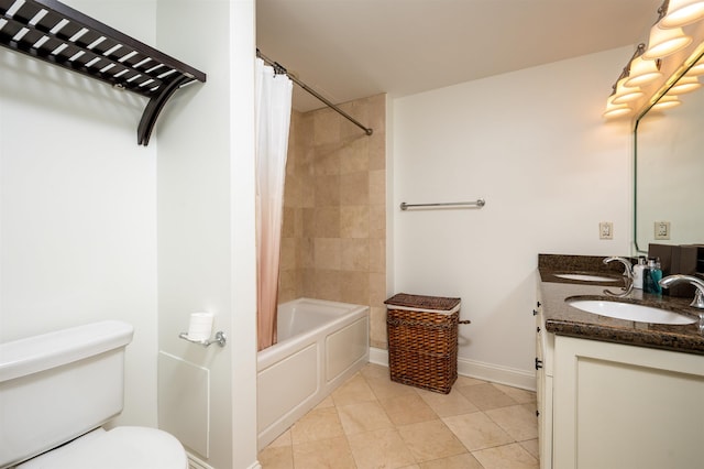 full bathroom with tile patterned flooring, vanity, shower / bath combination with curtain, and toilet