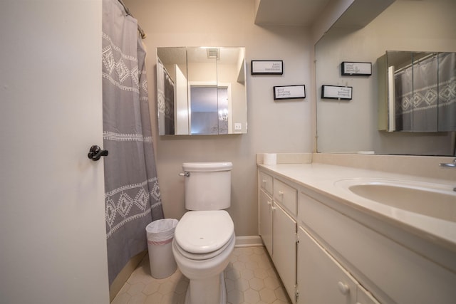 full bath featuring baseboards, visible vents, toilet, tile patterned flooring, and vanity
