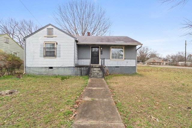 bungalow-style house with covered porch and a front yard