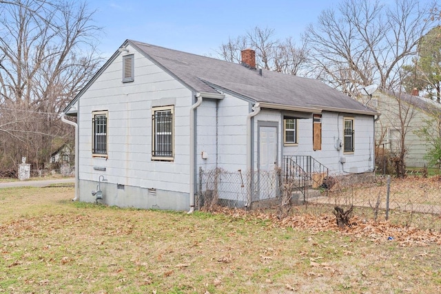 exterior space featuring a front lawn