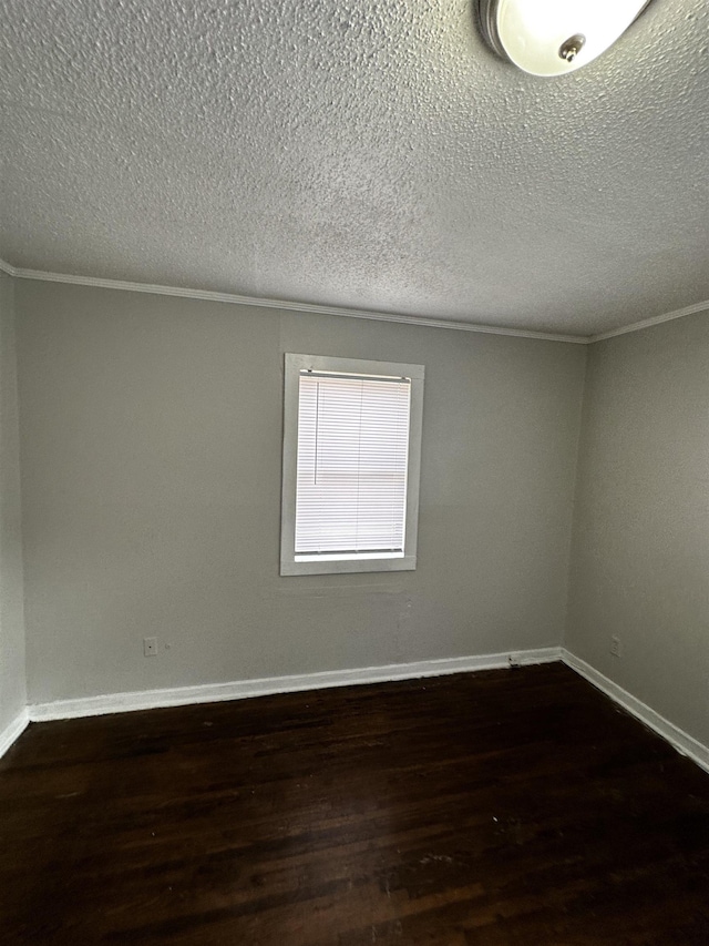 unfurnished room featuring crown molding, dark hardwood / wood-style floors, and a textured ceiling