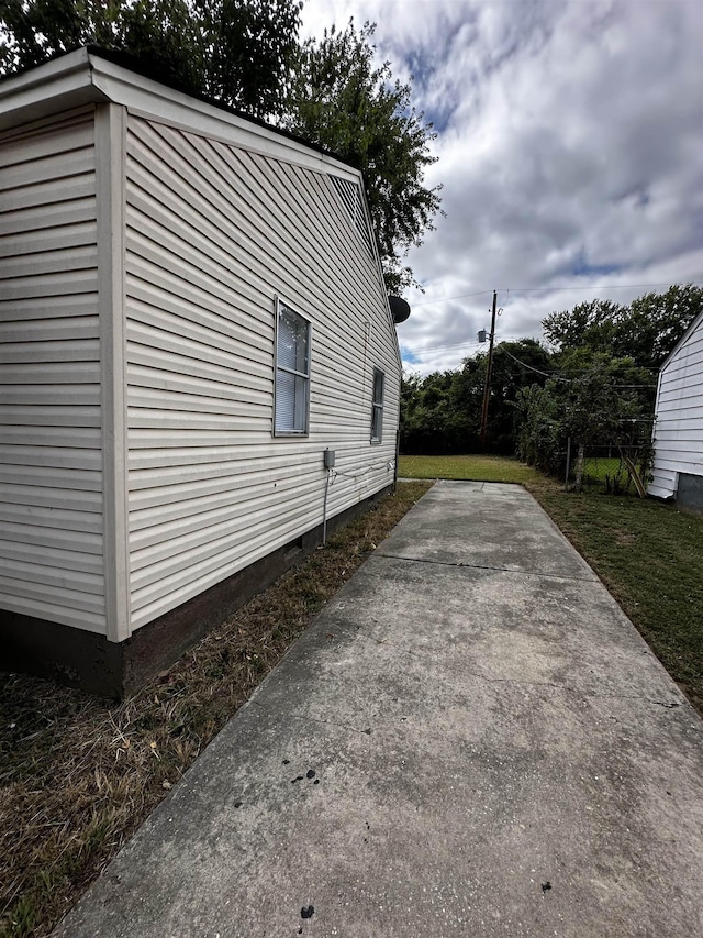 view of home's exterior with a patio