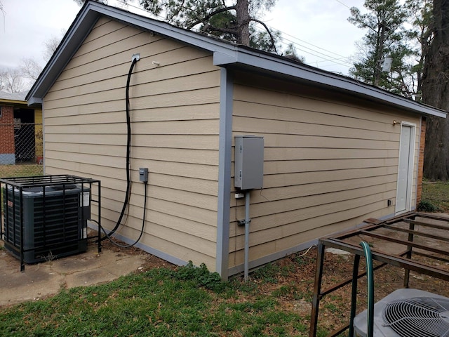 view of outbuilding featuring central air condition unit