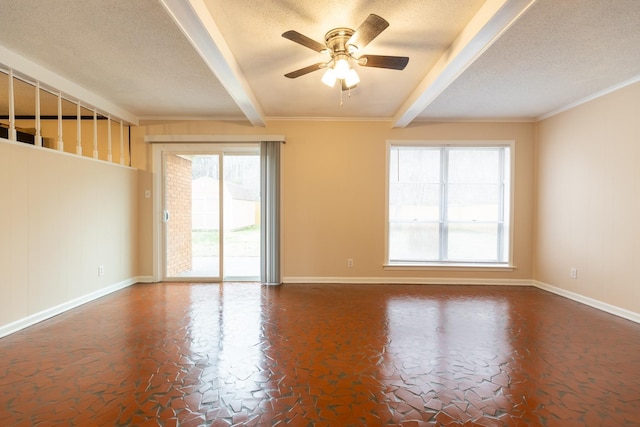 unfurnished room with beamed ceiling, a wealth of natural light, and a textured ceiling