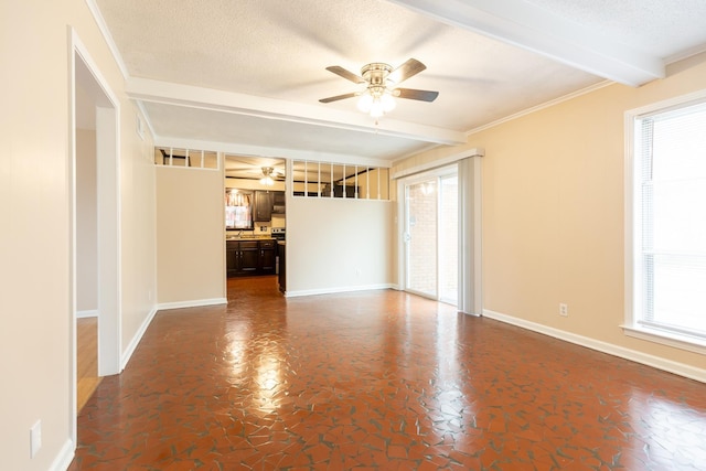 unfurnished room with ceiling fan, crown molding, a textured ceiling, and beam ceiling