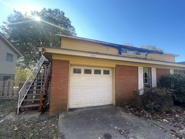 view of home's exterior with a garage