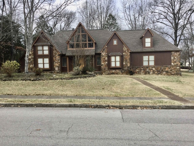 view of front of home with a front lawn