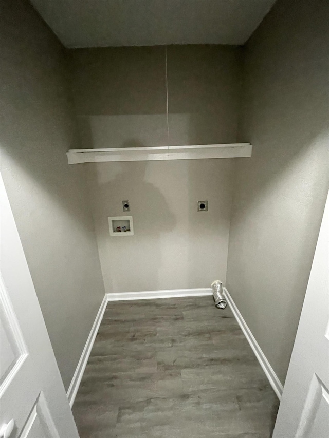 clothes washing area featuring washer hookup, hardwood / wood-style flooring, and hookup for an electric dryer