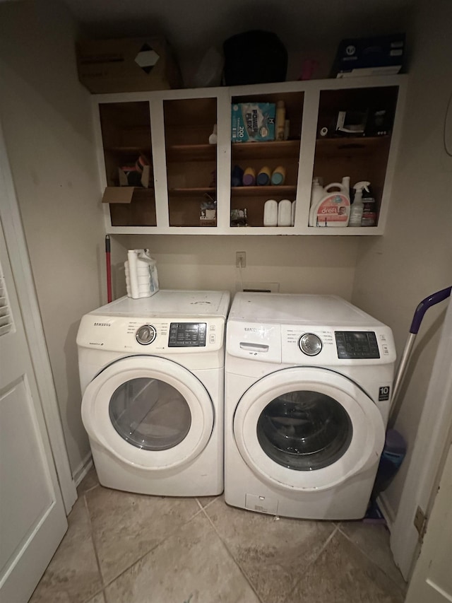 laundry area featuring washing machine and dryer