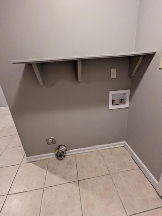 laundry area with light tile patterned flooring, washer hookup, and electric dryer hookup