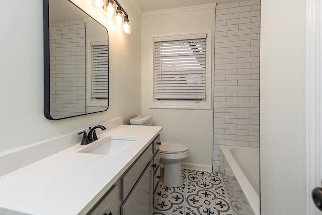 bathroom with crown molding, vanity, toilet, and tile patterned flooring