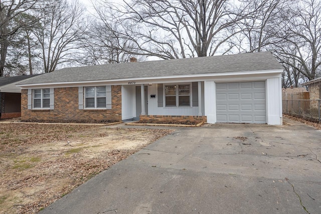 single story home with a garage