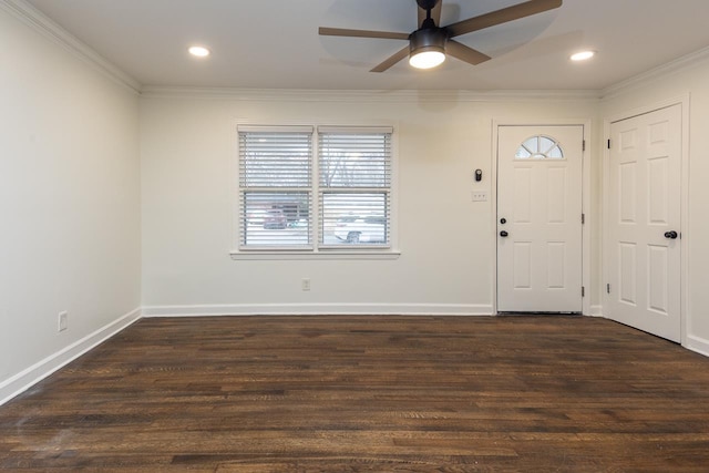 entryway with crown molding, ceiling fan, and dark hardwood / wood-style floors