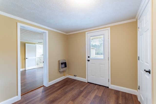 foyer entrance featuring heating unit, ornamental molding, dark hardwood / wood-style floors, and a textured ceiling