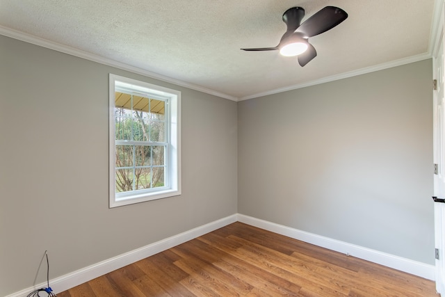 unfurnished room featuring hardwood / wood-style flooring, ceiling fan, crown molding, and a textured ceiling