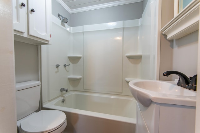 full bathroom featuring crown molding, vanity, toilet, and bathing tub / shower combination