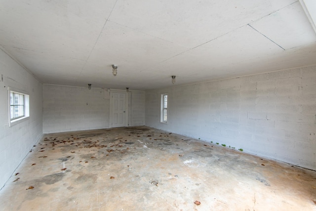 spare room featuring concrete flooring