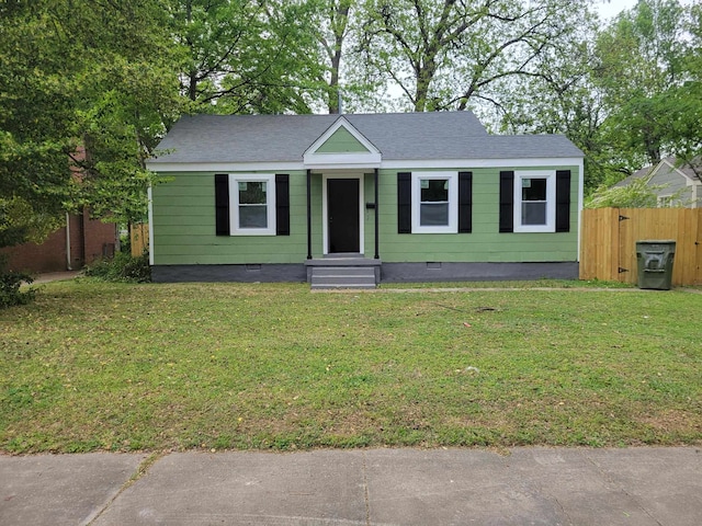 view of front of property with a front lawn