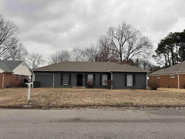 single story home with a garage