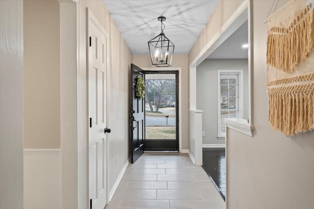 6961 Wittenham Cv, Memphis, TN 38119 - entrance foyer featuring a notable chandelier and tile patterned floors