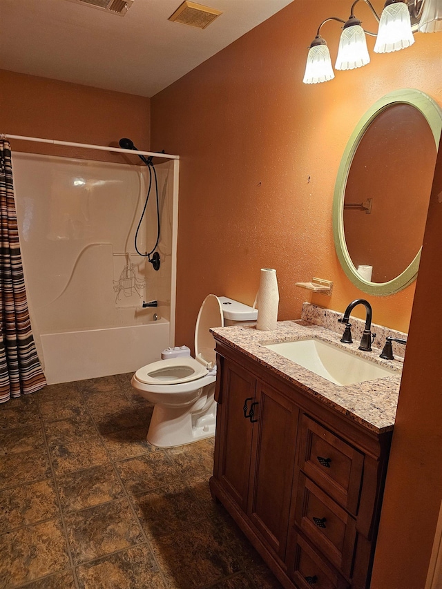 full bathroom with  shower combination, toilet, and vanity