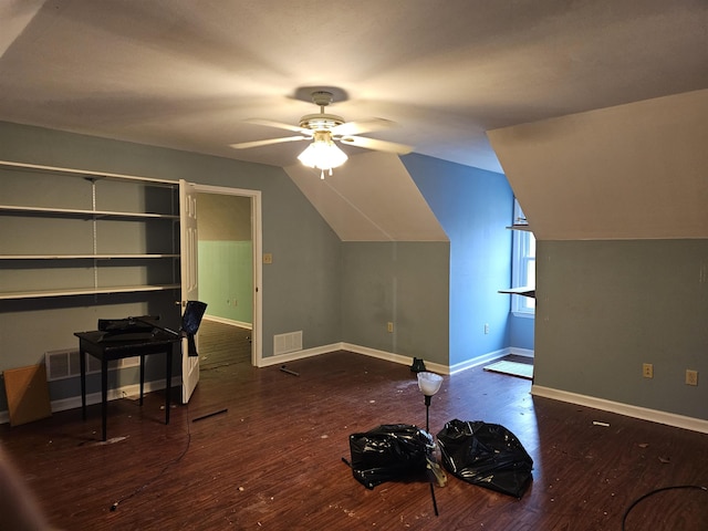 bonus room with vaulted ceiling, dark hardwood / wood-style floors, and ceiling fan