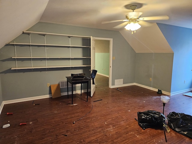 additional living space featuring ceiling fan, wood-type flooring, and vaulted ceiling