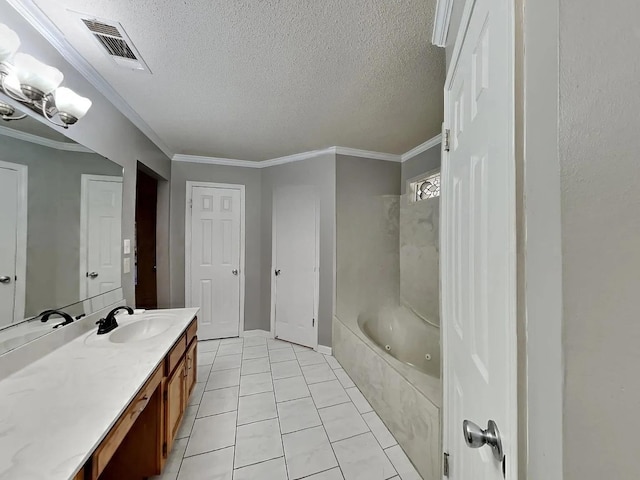 bathroom with vanity, a bath, a textured ceiling, and crown molding