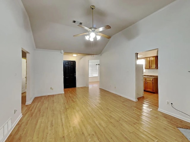 unfurnished living room with ceiling fan, high vaulted ceiling, and light hardwood / wood-style floors