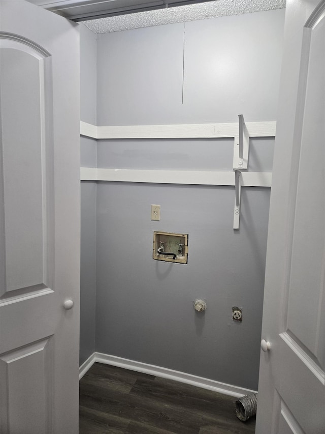 washroom with electric dryer hookup, washer hookup, and dark hardwood / wood-style flooring