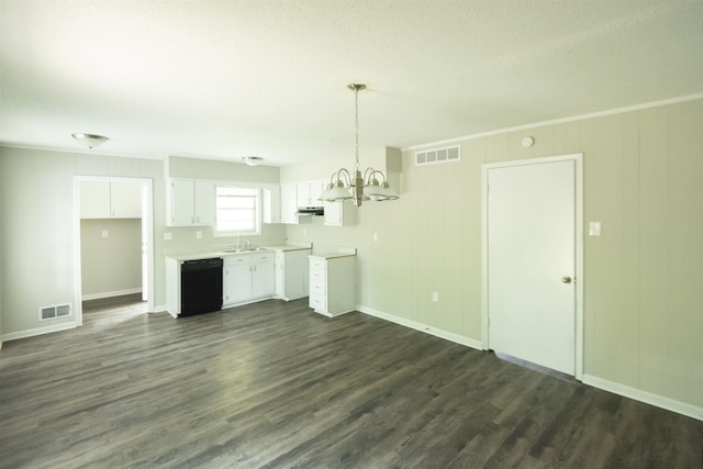 unfurnished living room with an inviting chandelier, sink, and dark hardwood / wood-style floors