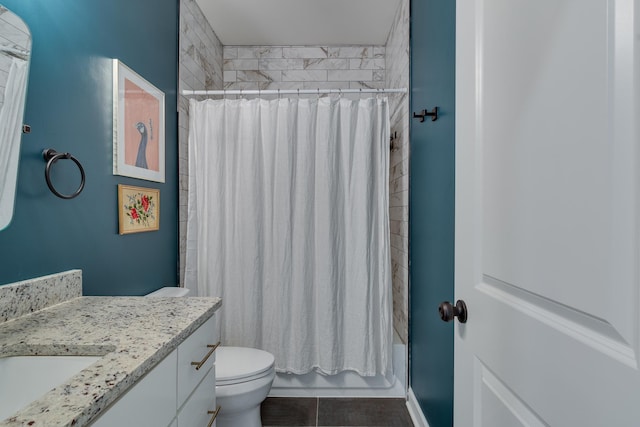 full bathroom with vanity, shower / bath combo with shower curtain, and toilet