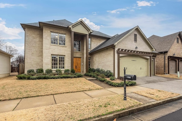 front of property with a garage