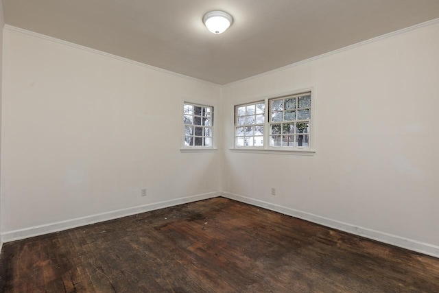 unfurnished room with dark wood-type flooring and ornamental molding