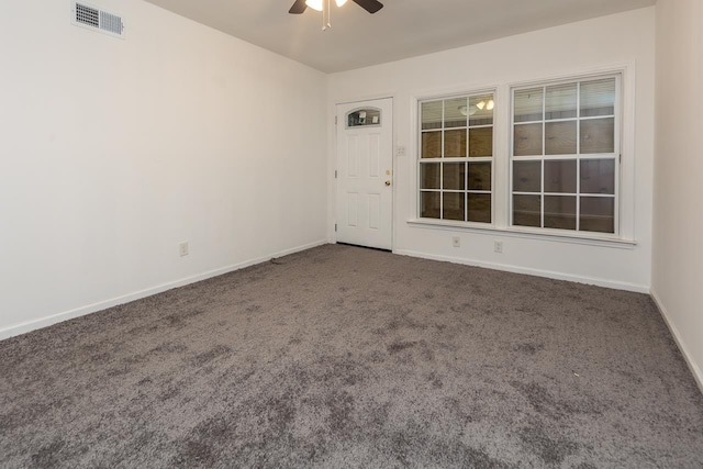 carpeted empty room with ceiling fan