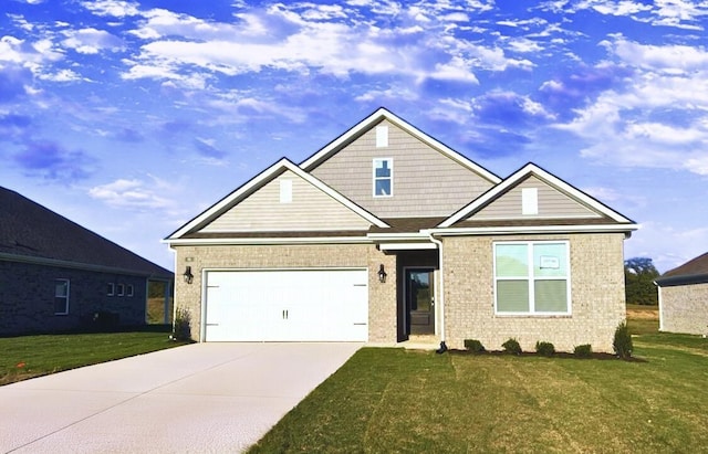 craftsman inspired home featuring a garage and a front lawn