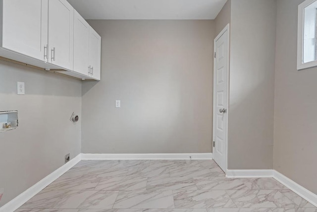 laundry room featuring cabinets and washer hookup