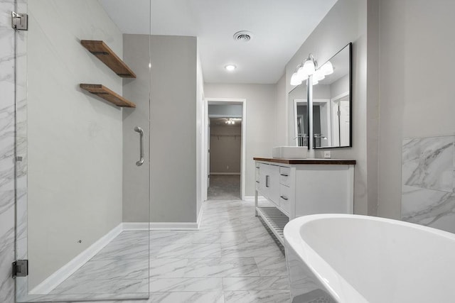 bathroom featuring vanity and separate shower and tub