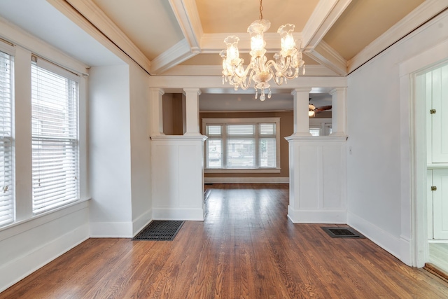 unfurnished dining area with dark wood-type flooring, ornamental molding, beam ceiling, and decorative columns