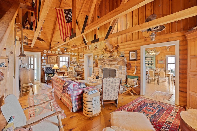 living room featuring rustic walls, wood ceiling, high vaulted ceiling, hardwood / wood-style flooring, and beam ceiling