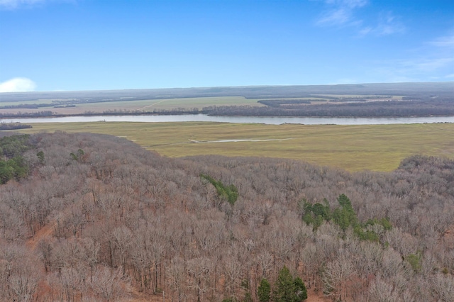 birds eye view of property featuring a water view and a rural view